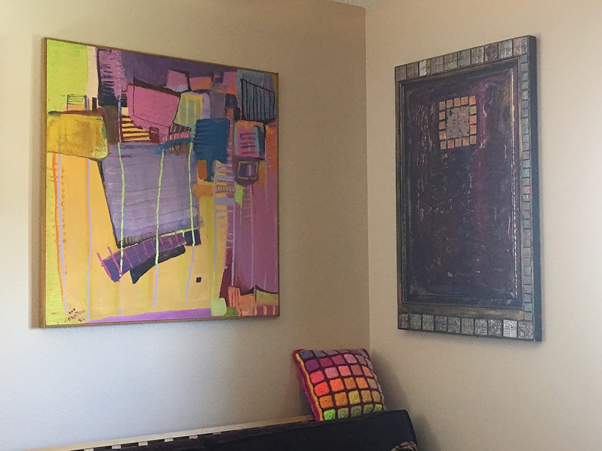 Main Guest Room "The Yarn Room" featuring acrylic painting, 1982 (left), and mixed metallic media painting circa 2002. The crocheted pillow was created using both paintings as inspiration.